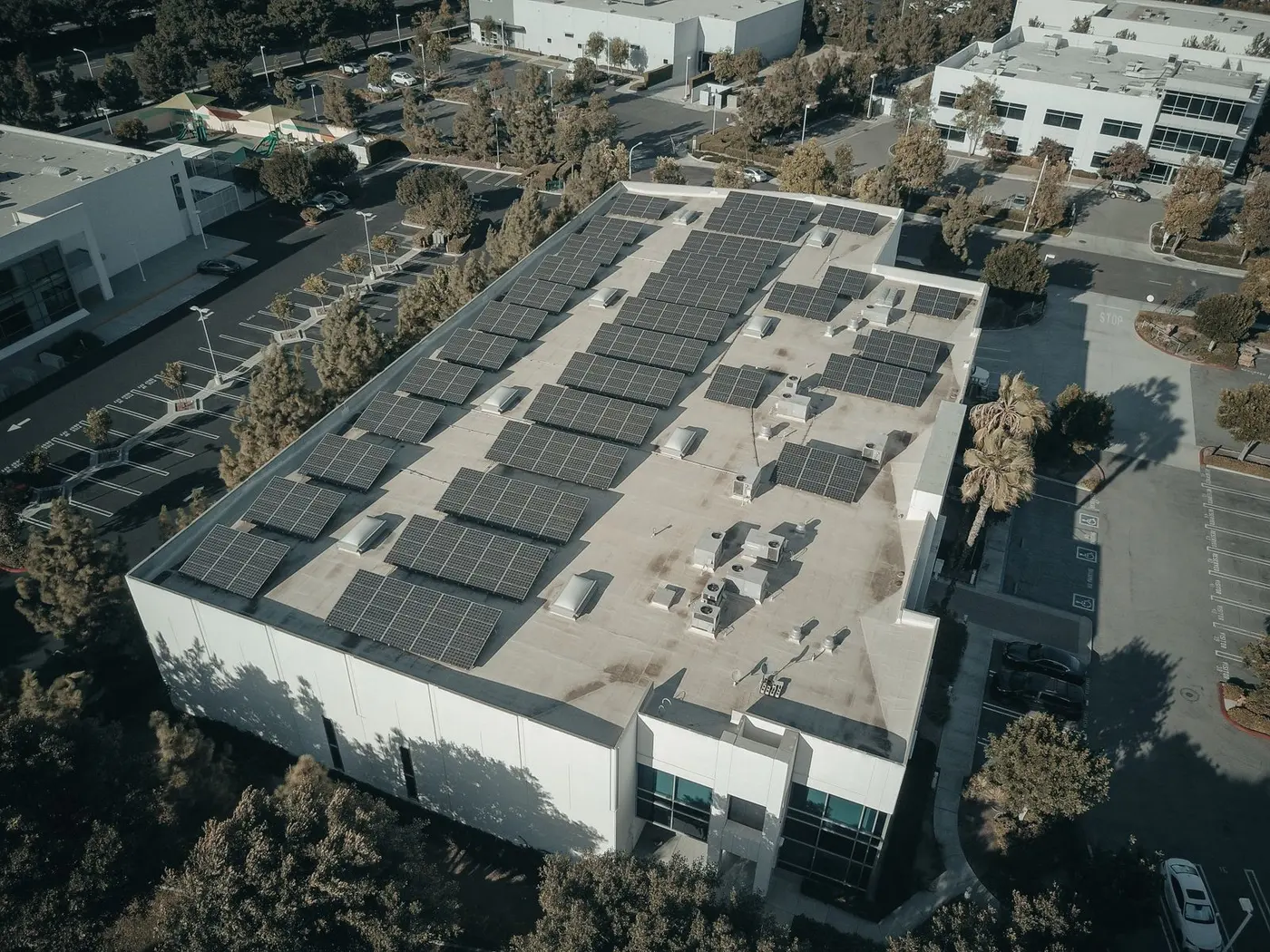 Solar panels installed on a factory rooftop