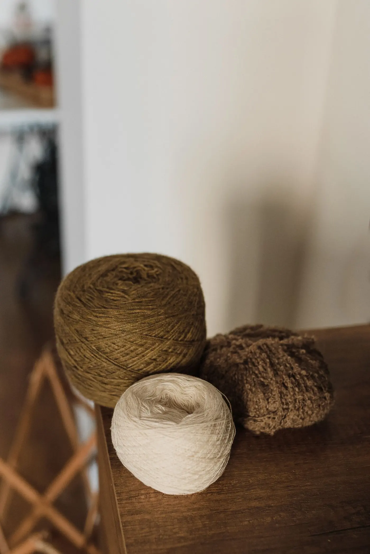 Natural fibre yarn rolls in earthy tones